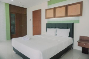 Spacious and Homey 2BR Mangga Dua Apartment By Travelio